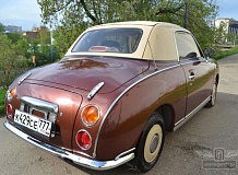 ретро автомобиль Nissan Figaro