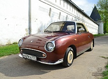 ретро автомобиль Nissan Figaro